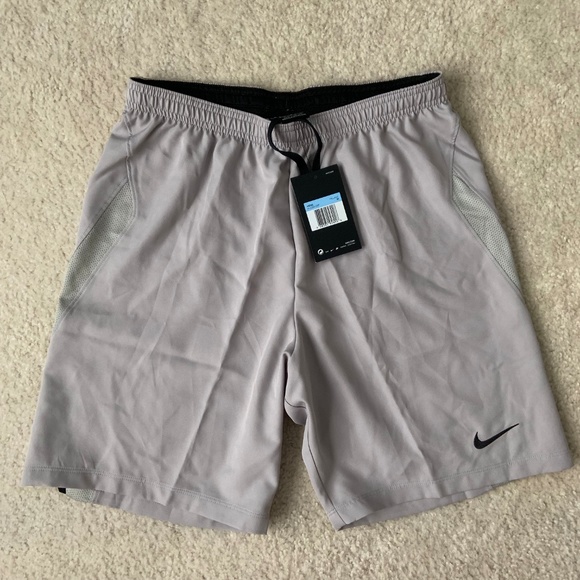 nike women's dry woven laser iv short